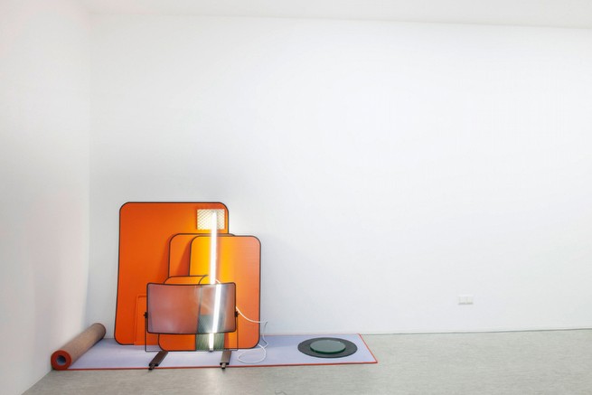 Sebastian Kuhn, Under Water Love, 2012<br/>tin, carpet flooring, fibreglass tablet, neon light, rubber, glass, cable, foam material<br/>130 x 250 x 80 cm<br/>